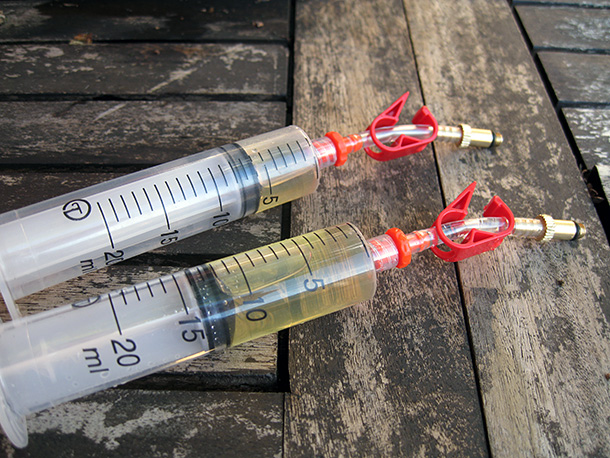 Avid bleed kit syringes containing DOT 5.1 brake fluid